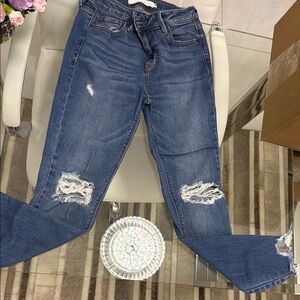 Blue Skinny Jeans with Distressed Details